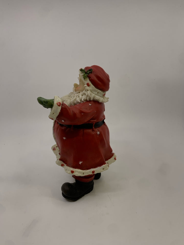 RESIN SANTA HOLDING OUT HIS HAND GREEN MITTEN.