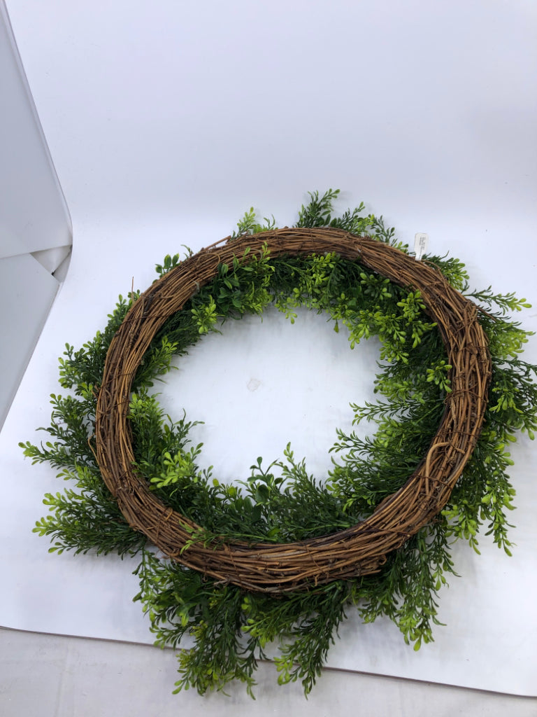 TWIG W GREENS WREATH.