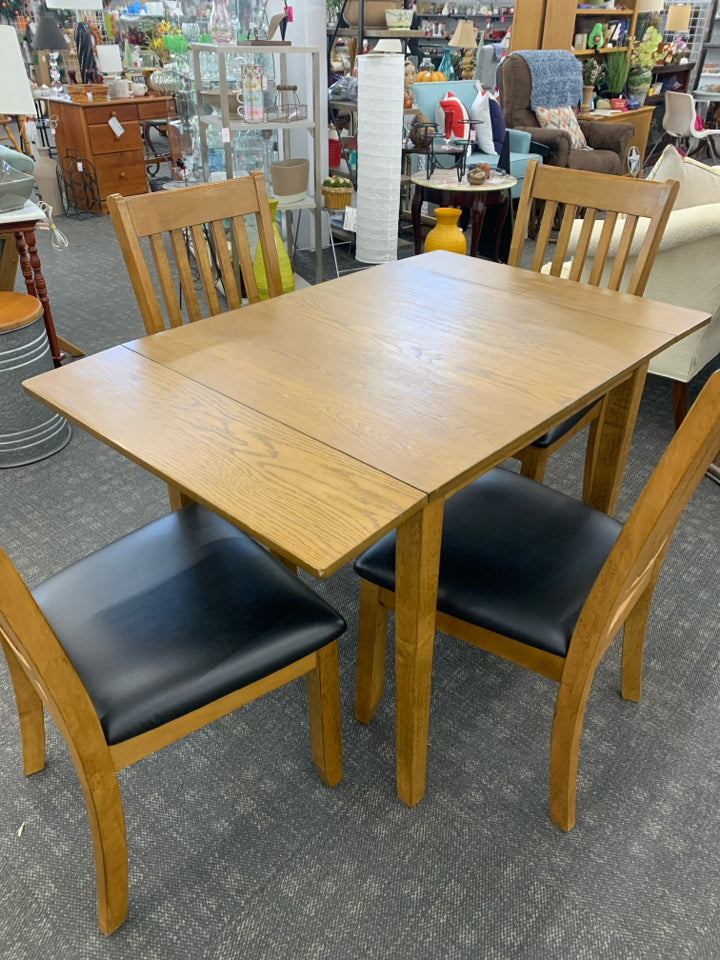 WOODEN KITCHEN TABLE W/ 4 CHAIRS.