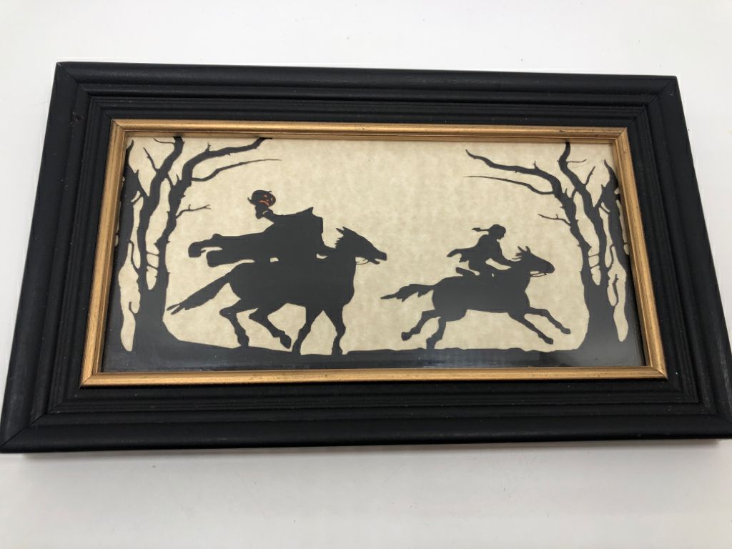 HALLOWEEN HEADLESS HORSEMAN SILHOUETTE IN BLACK FRAME.