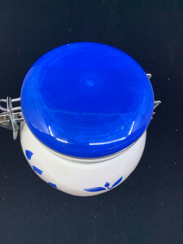 BLUE AND WHITE COOKIE JAR W METAL CLASP.