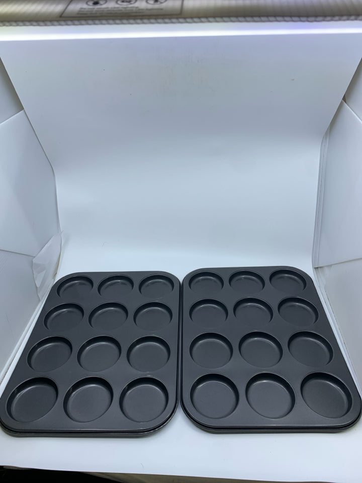 2 GREY MUFFIN TOP PANS.