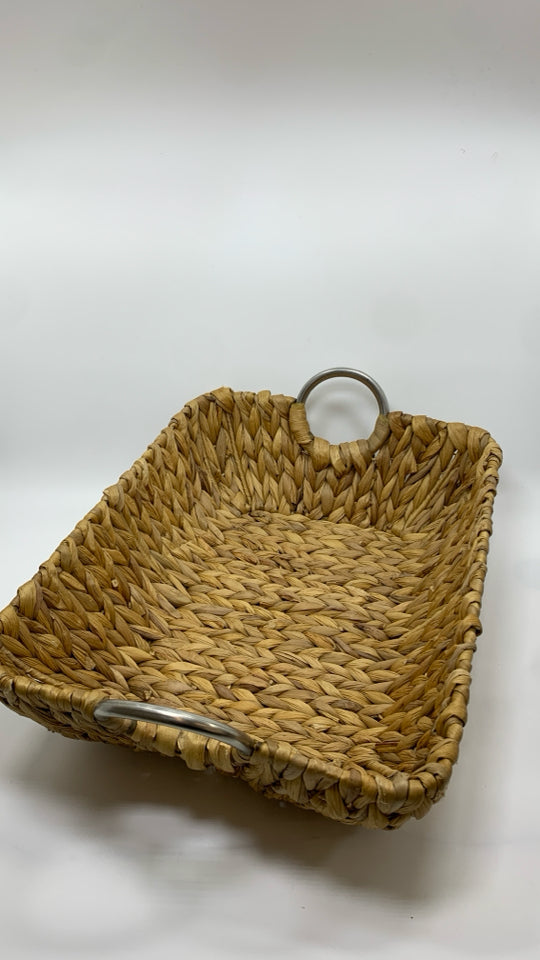 LONG WOVEN BASKET W/METAL HANDLES.