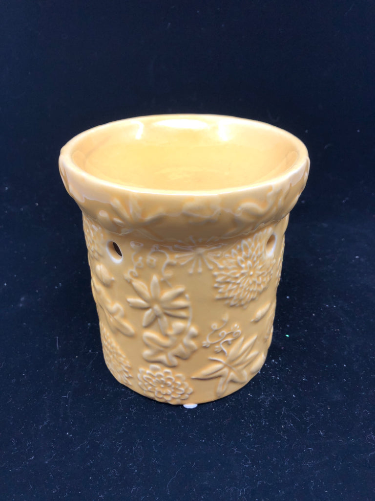 YELLOW W EMBOSSED LEAVES TEA LIGHT WAX MELT.