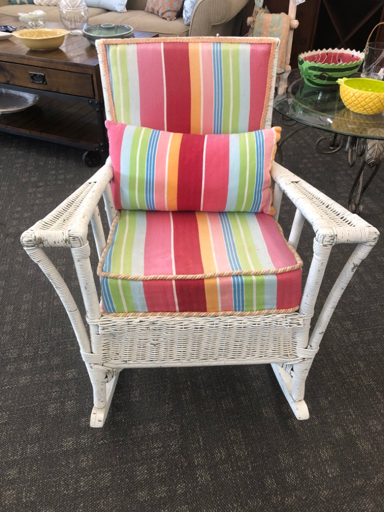 VTG WHITE WICKER ROCKING CHAIR W/ COLORFUL UPHOLSTERED BACK/CUSHION.
