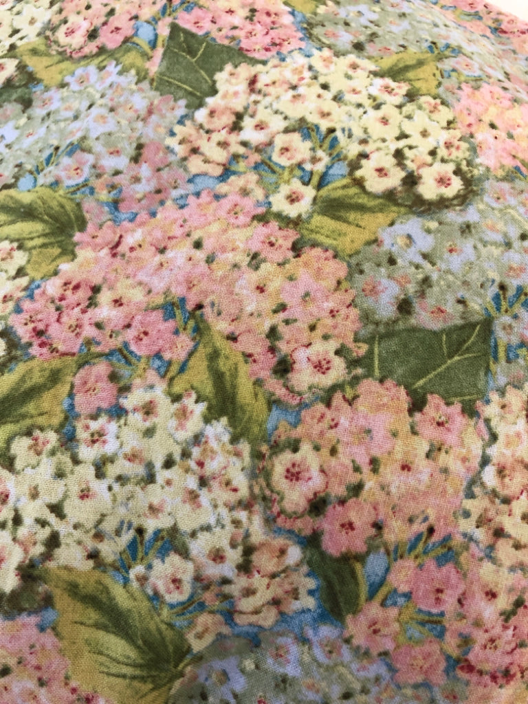 PINK AND BLUE FLORAL RECTANGLE PILLOW.