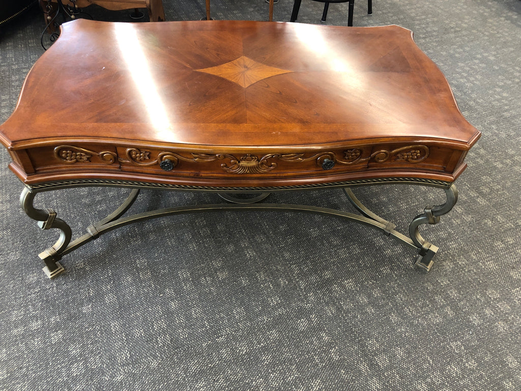 METAL BASE COFFEE TABLE, WOOD INLAY TOP W/2 CARVED DRAWERS.