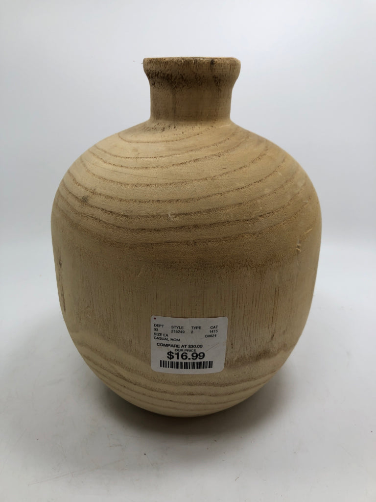 NATURAL CARVED WOOD VASE.