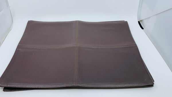 4 BROWN LEATHER PLACE MATS.