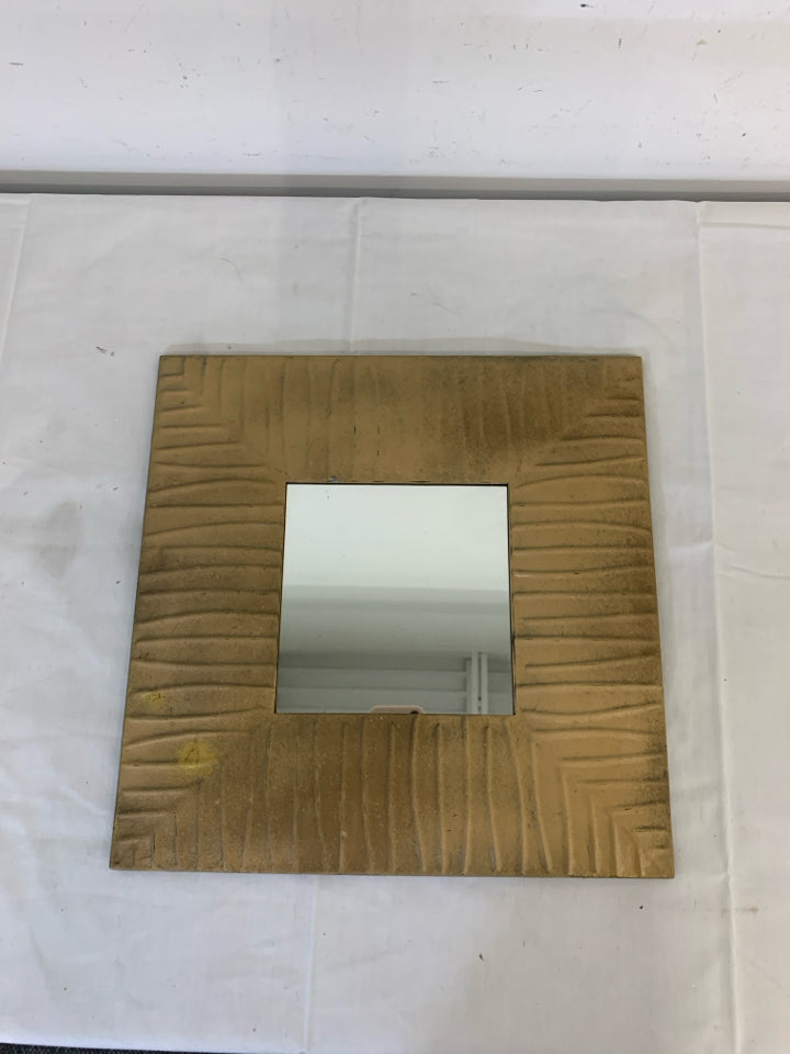 TEXTURED TAN SQUARE METAL MIRROR.