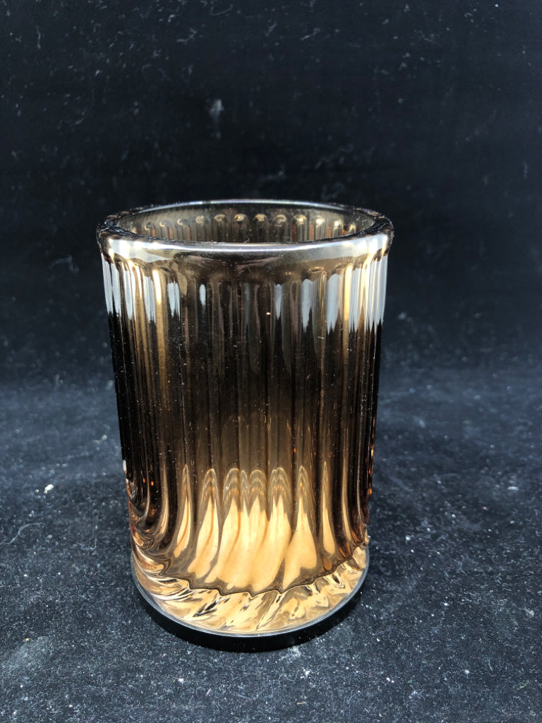 BROWN RIBBED GLASS CANDLE HOLDER.