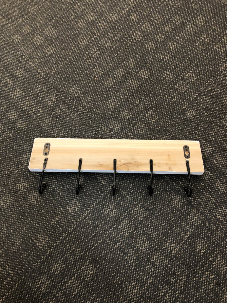 WHITE WOOD W/5 BLACK HOOKS COAT HOOK.