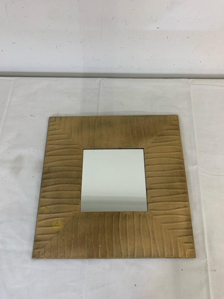 TEXTURED TAN SQUARE METAL MIRROR.