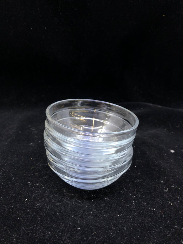 4 SMALL CLEAR SPICE JARS.