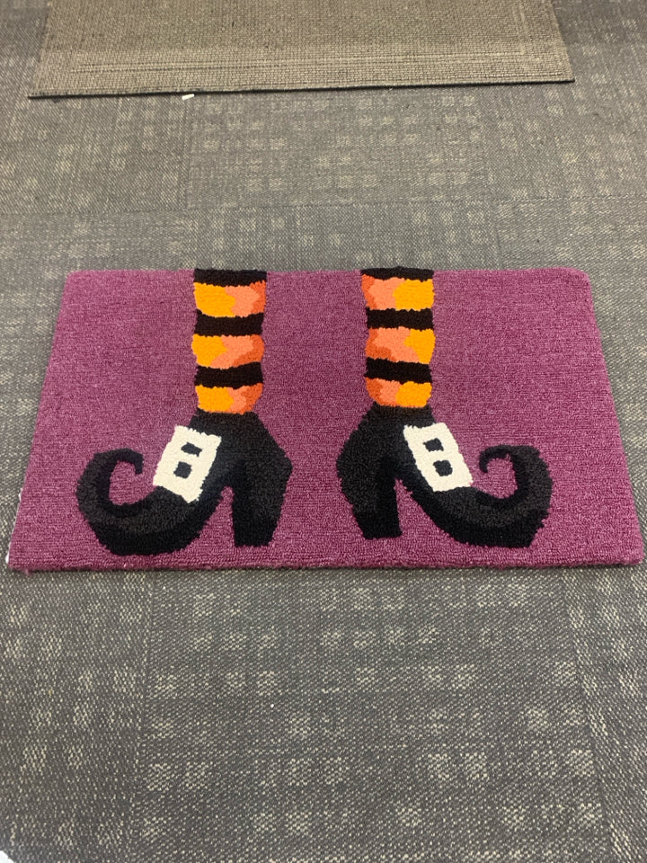 PURPLE WITCH BOOTS HAND HOOKED ACCENT RUG.