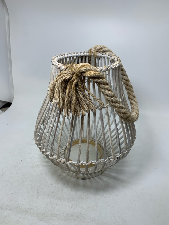 WHITE WASHED STICK LANTERN W/ BRAIDED HANDLE.