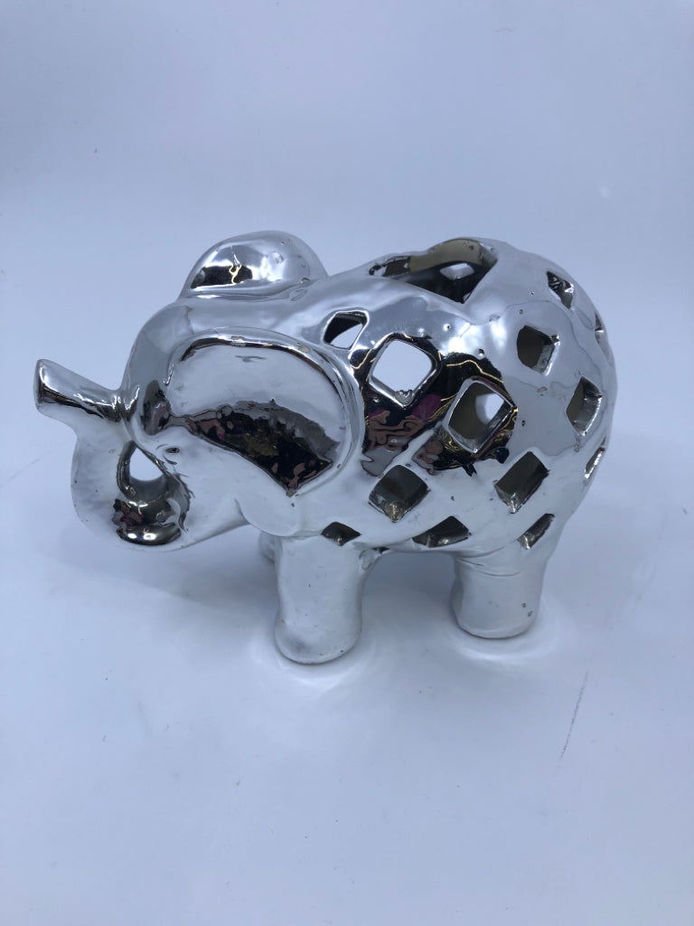 SILVER PIERCED ELEPHANT TEAL LIGHT HOLDER.