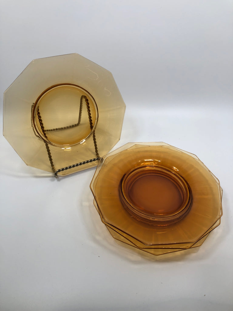4 AMBER GLASS SIDE PLATES.