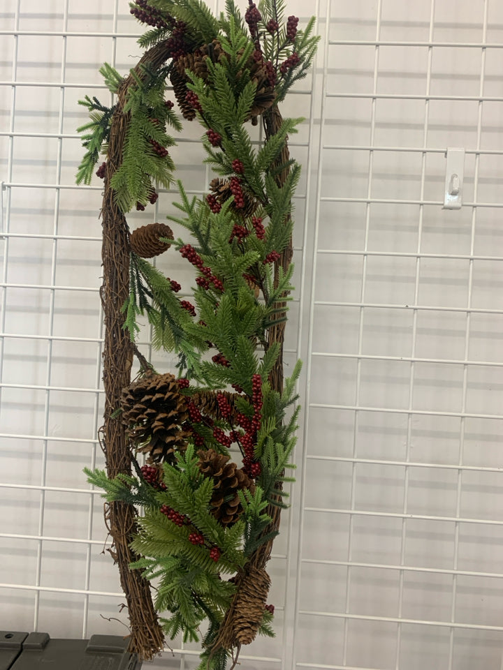 PINECONES AND RED PIP BERRY GARLAND.