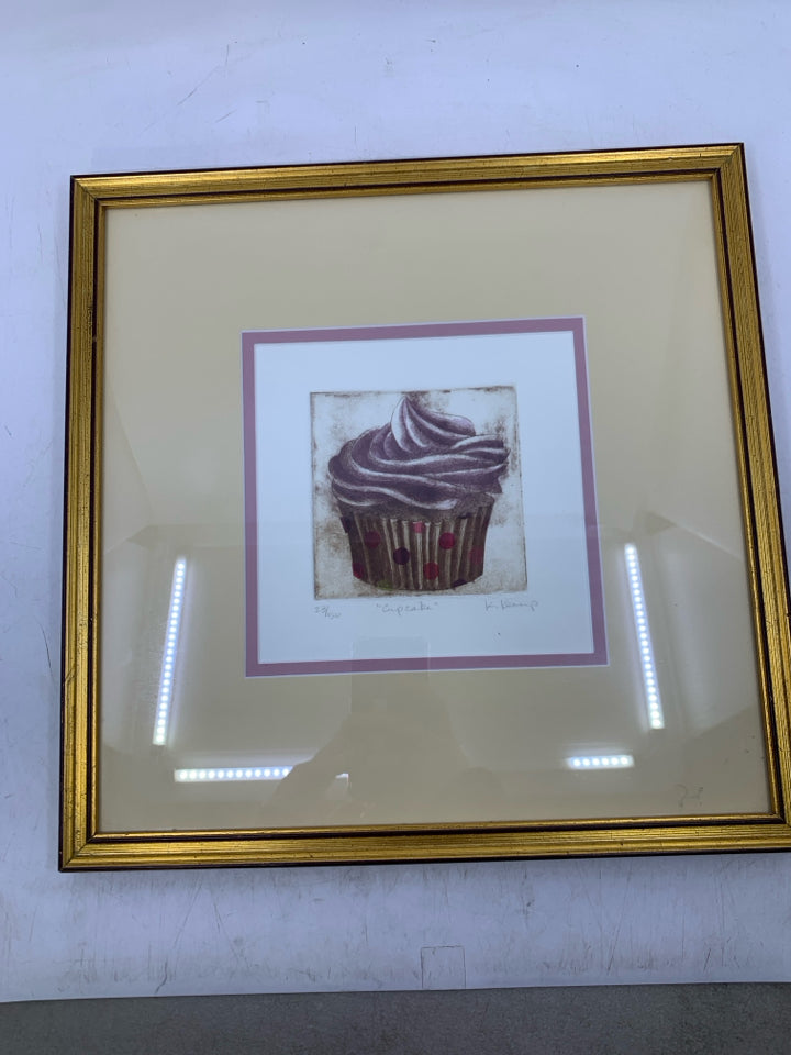 CUPCAKE ETCHING SIGNED BY ARTIST IN GOLD FRAME.