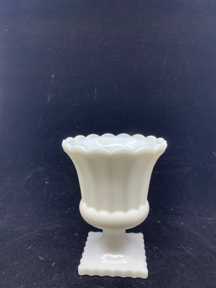 VTG FOOTED MILK GLASS VASE.