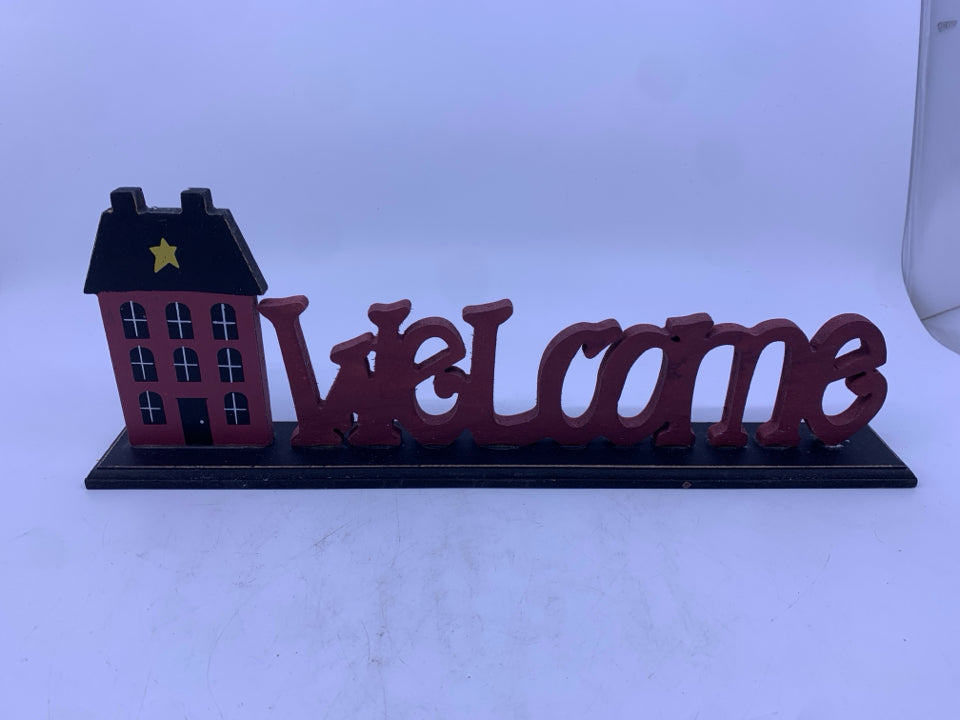 PRIMITIVE WELCOME SIGN W RED HOUSE.