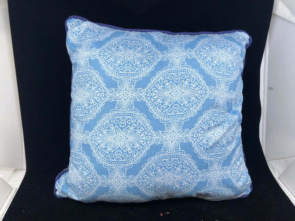 BLUE AND WHITE PATTERN W SOLID BLUE SQUARE PILLOW.