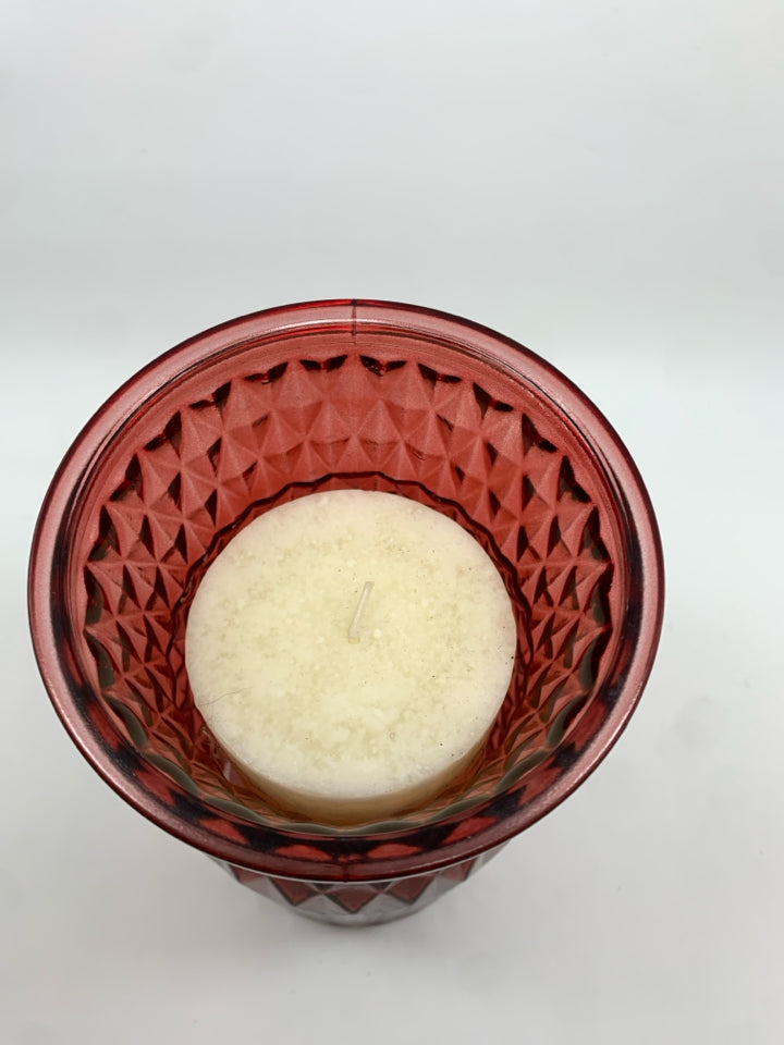 RED GLASS CANDLE HOLDER W/WHITE CANDLE.