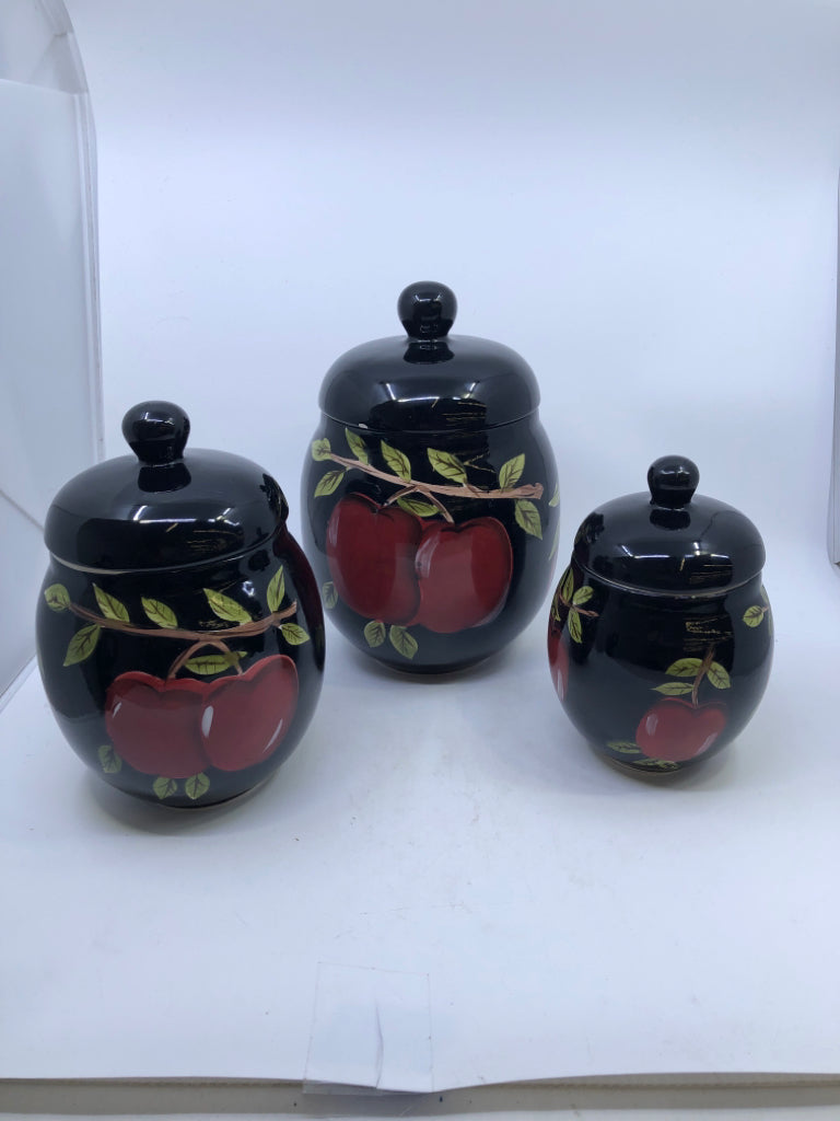 3 BLACK CANISTERS W/ PAINTED RED APPLES/BRANCHES.