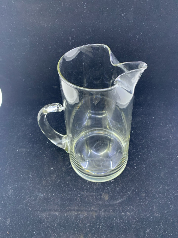 TALL GLASS PITCHER W ICE LIP.