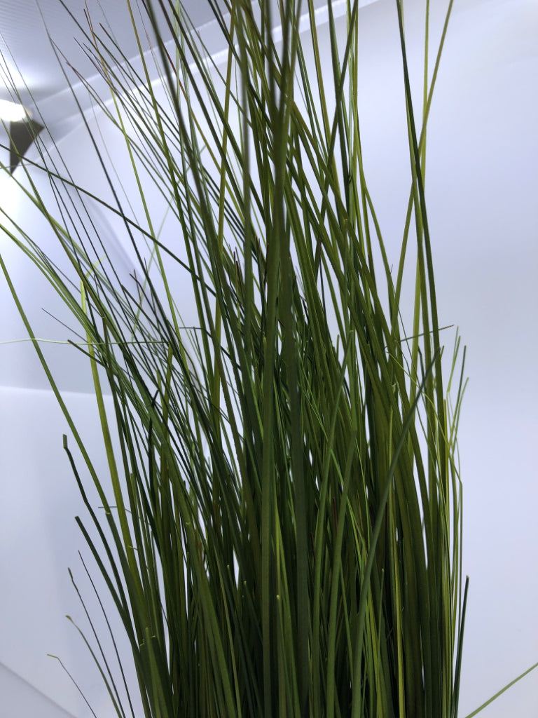 WHITE PLANTER W TALL FAUX GRASS.