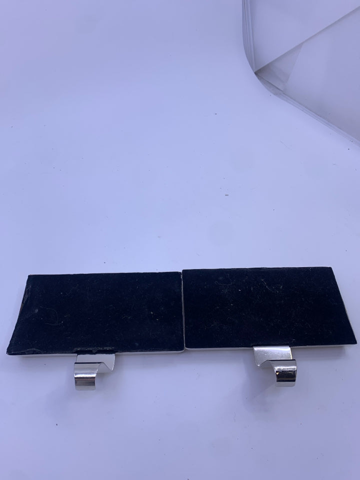 2 SILVER STOCKING HOLDERS.