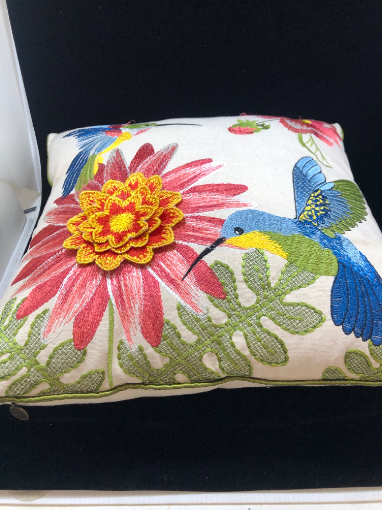 LAYERED HUMMINGBIRD PILLOW.