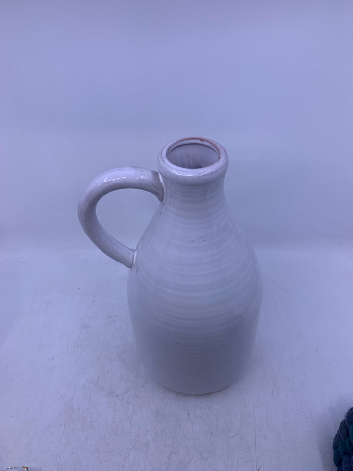 WHITE VASE RIBBED LOOK W/ HANDLE.