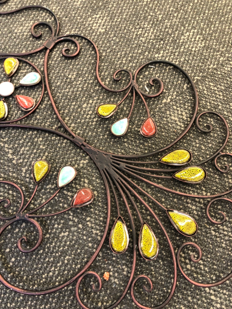 SCROLL METAL WALL ART W/ COLORFUL STONES.