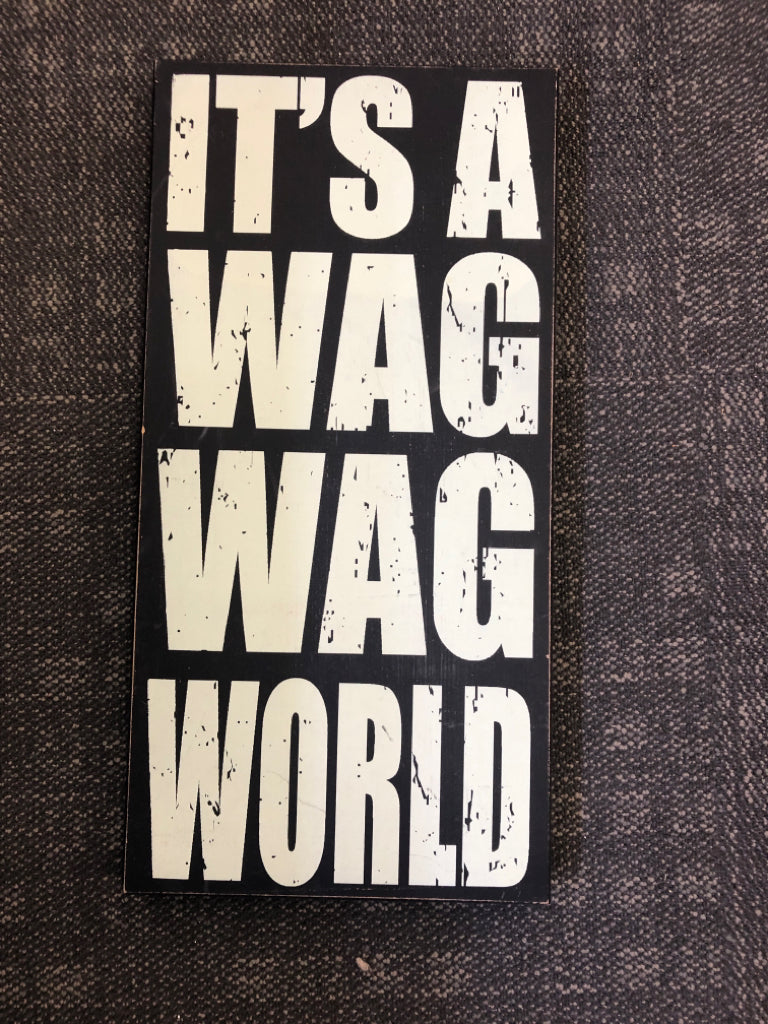 ITS A WAG WORLD WOOD BLOCK SIGN.