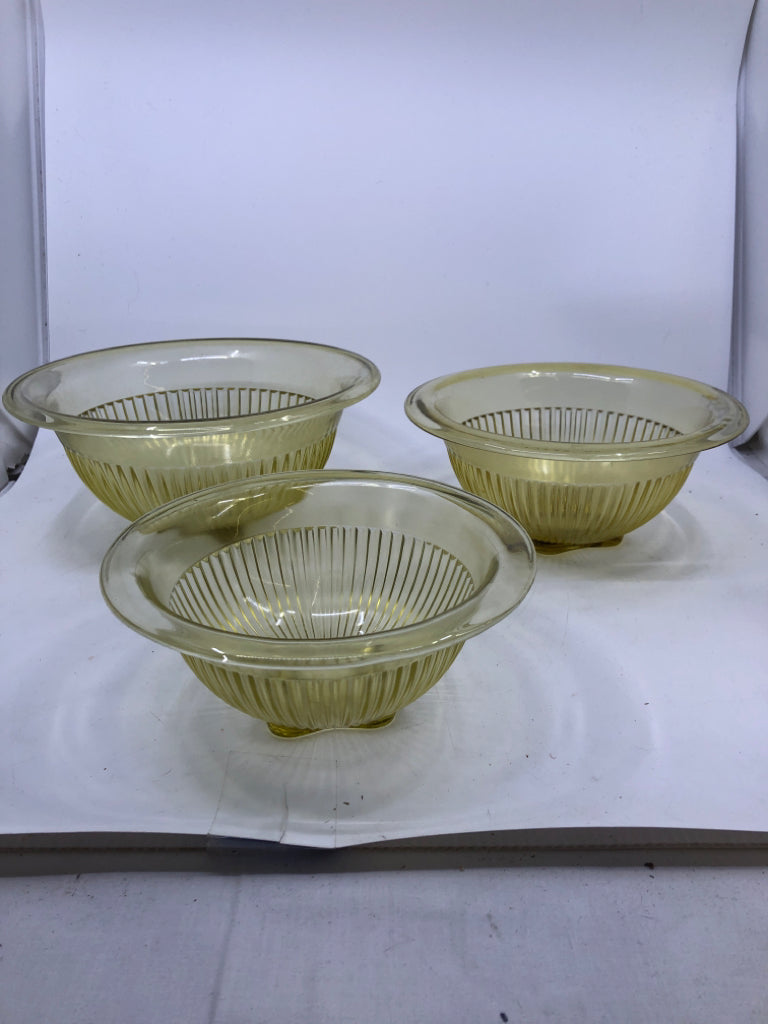 3 VTG YELLOW RIBBED GLASS NESTING BOWLS.