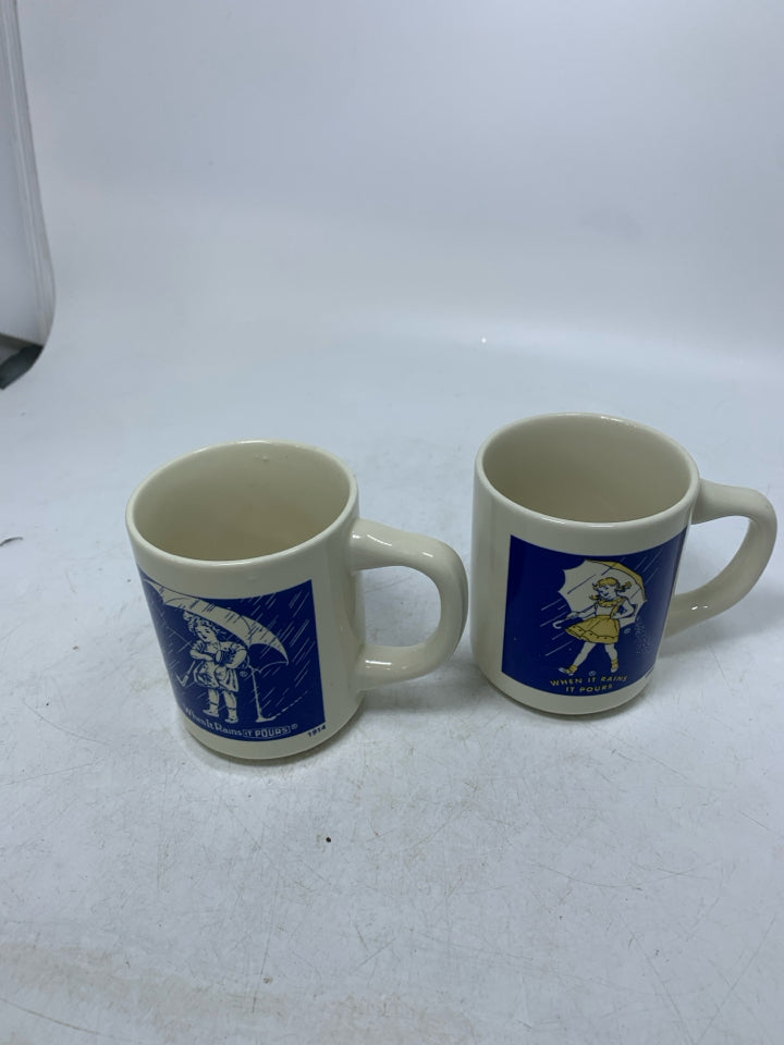 2 VTG WHEN IT RAINS IT POUR SALT MUGS.