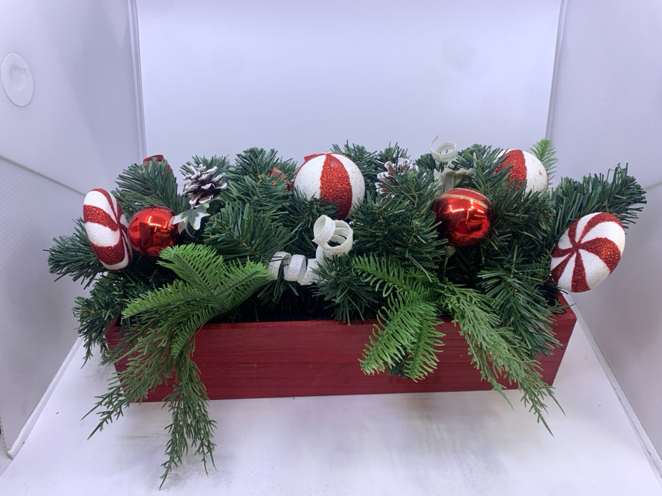 RED CRATE W CHRISTMAS ORNAMENTS ARRANGEMENT.