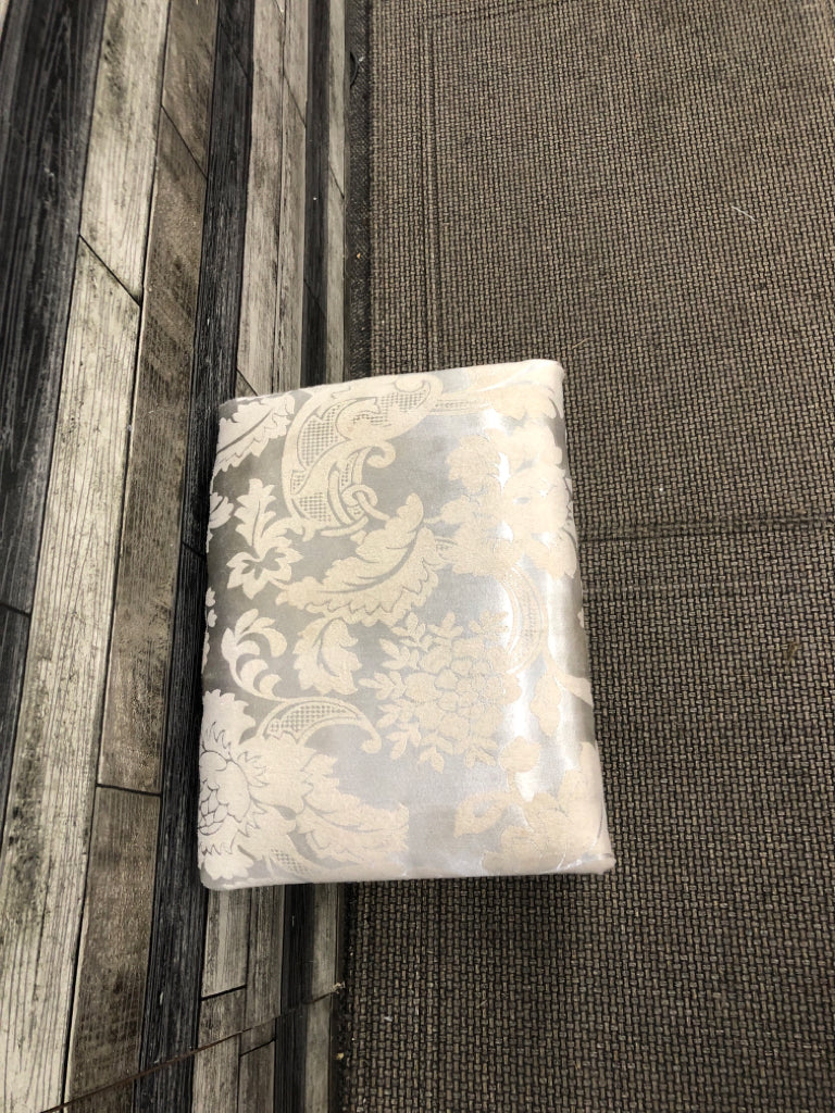 SILVER FLORAL VANITY STOOL W/WHITE WOOD BASE.