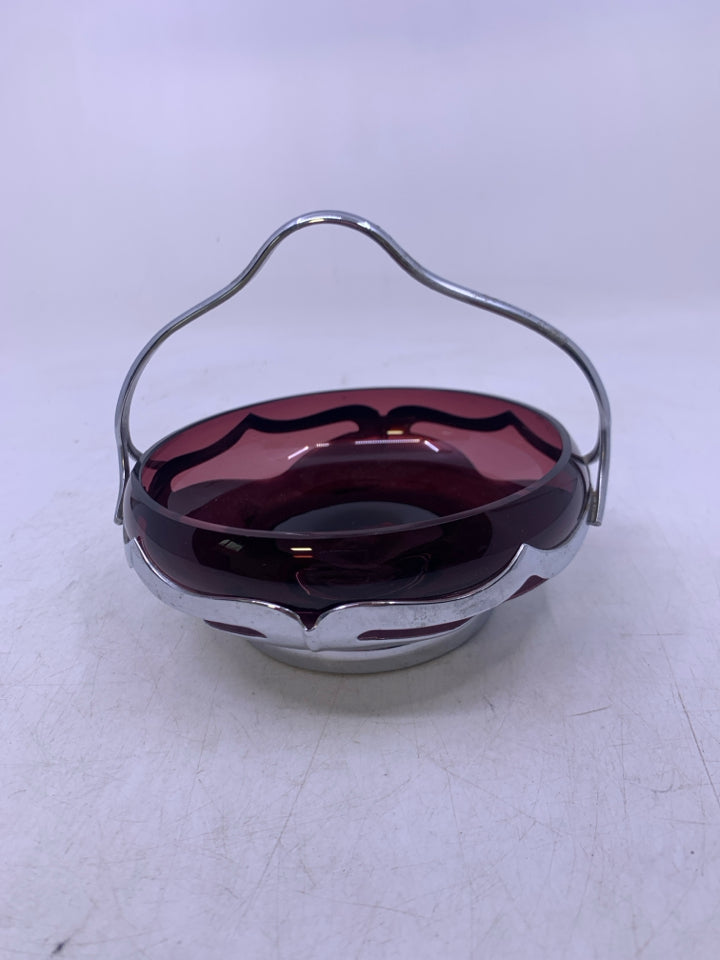 SILVER METAL BASE W/ SHALLOW PURPLE GLASS INSERT.