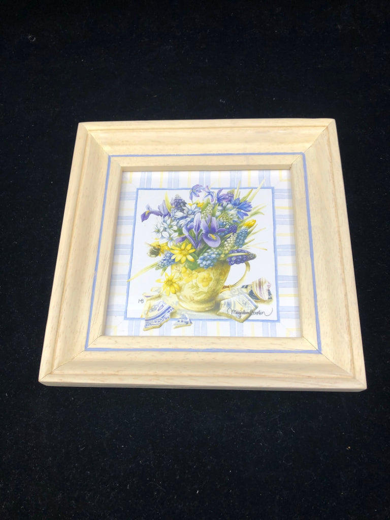 PURPLE FLORAL IN CREAM FRAME WALL HANGING.