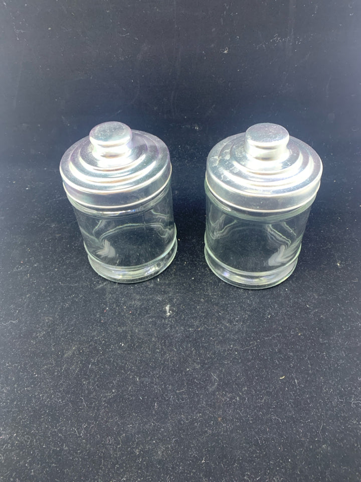 2 GLASS CANISTER W SILVER TOP.