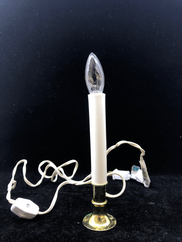 WHITE PLUG IN CANDLE LIGHT.