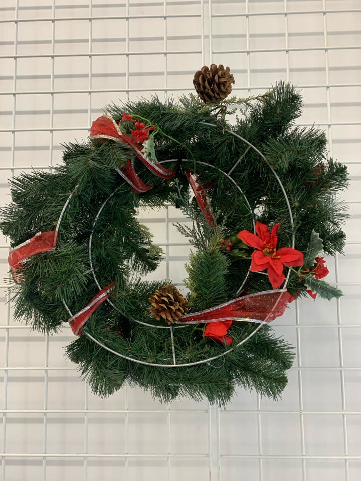 POINSETTIA AND PINECONE WREATH.