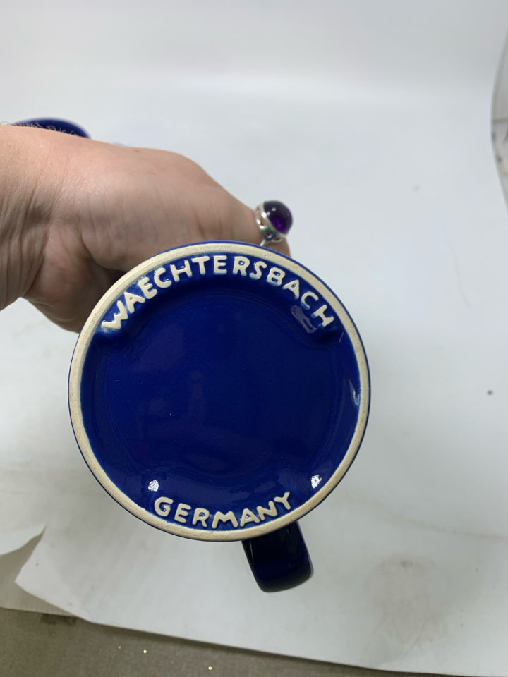 2 DARK BLUE WAECHTERSBACH CHRISTMAS VILLAGE MUGS.