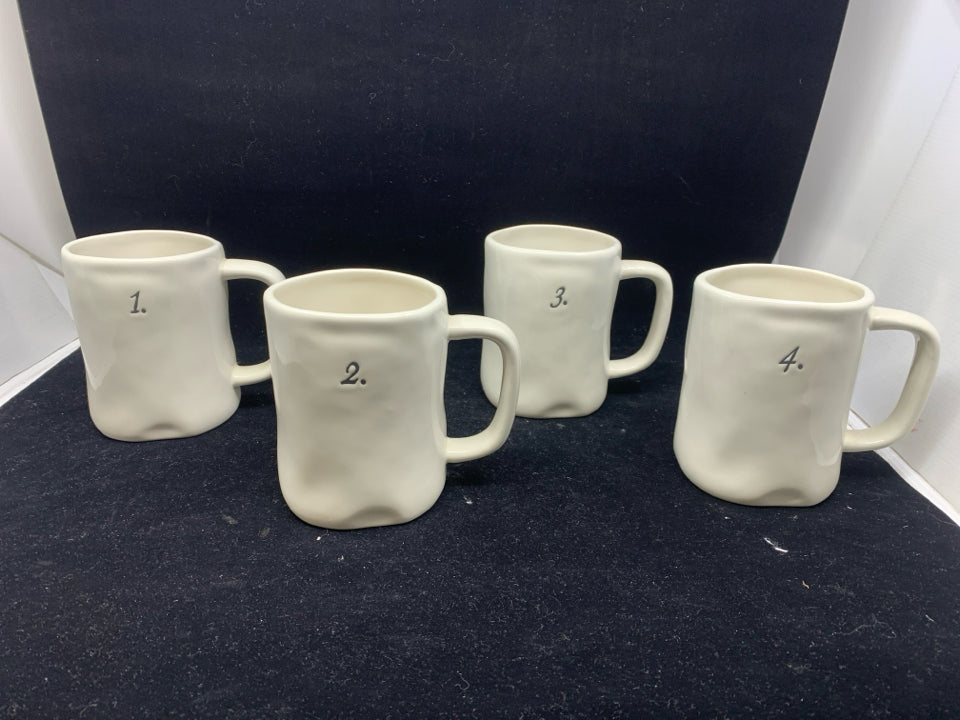 RAE DUNN 1-4 WHITE MUGS.