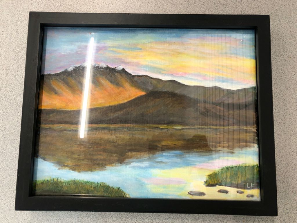 MOUNTAIN LAKE PAINTING IN BLACK WOOD FRAME.