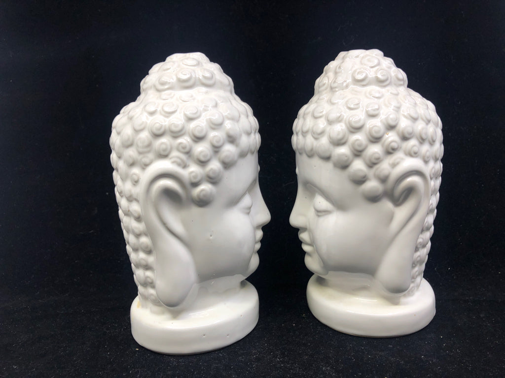 2 WHITE CERAMIC BUDDHA HEADS.