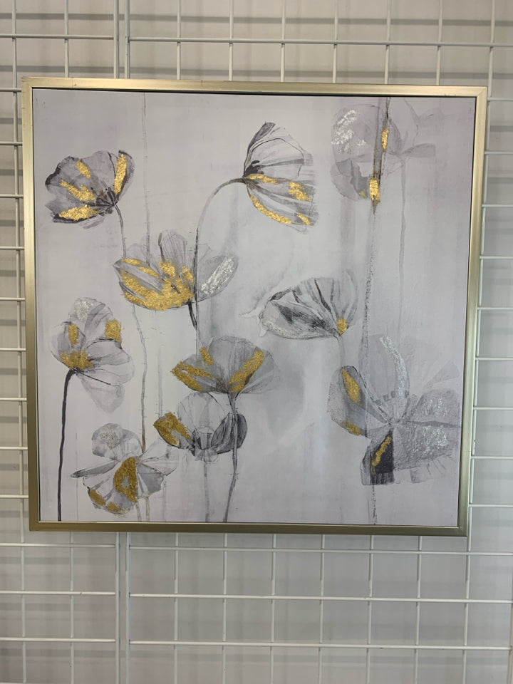 MANY B&W FLORALS ON FRAMED CANVAS W/GOLD DETAILS.